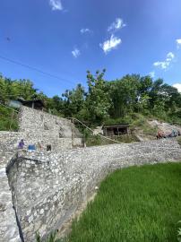 PEMBANGUNAN TALUD TANAH LONGSOR